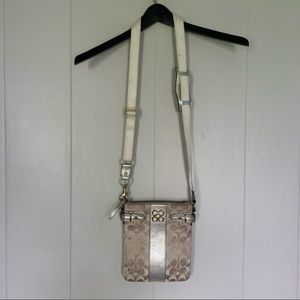 Coach gold cross body purse